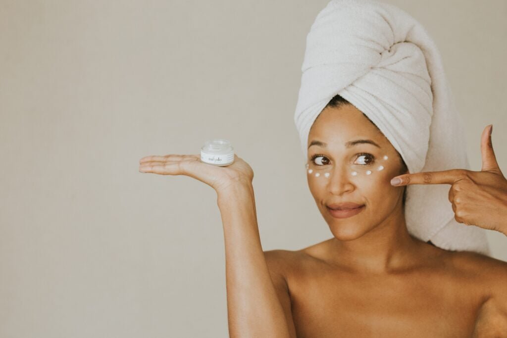 woman is showing that retinol is important at her age